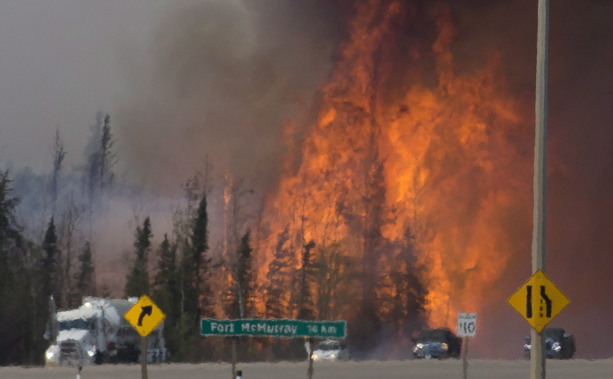 Officials say it could take months to extinguish massive Alberta blaze Image