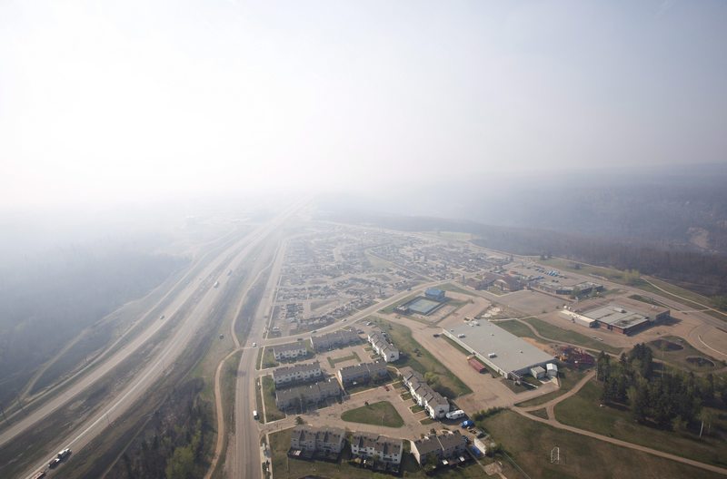 Work camps north of Fort McMurray evacuated due to growing wildfire Image