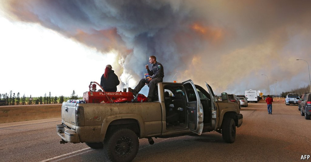 Alberta reviews Fort McMurray wildfire re-entry plan as flames spread north Image
