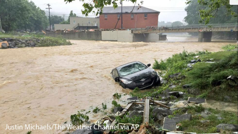 14 dead in West Virginia floods; focus on search and rescue Image