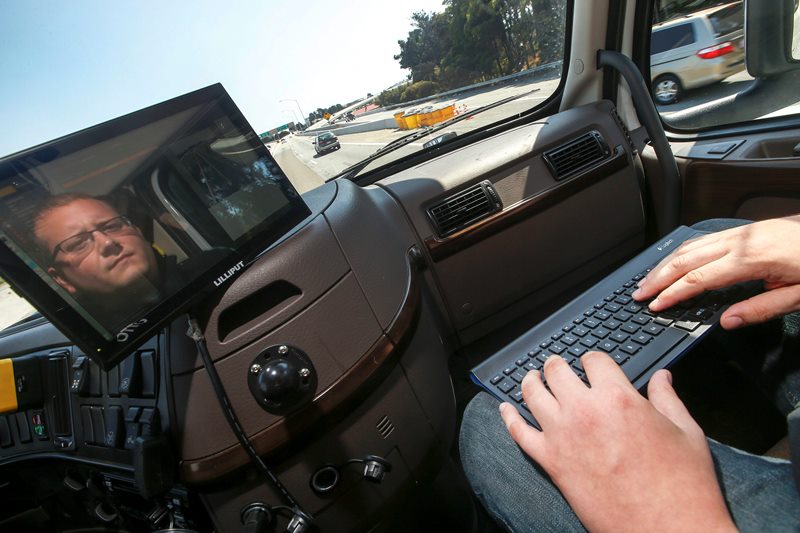 Self-driving cars go public; Uber offers rides in Pittsburgh Image