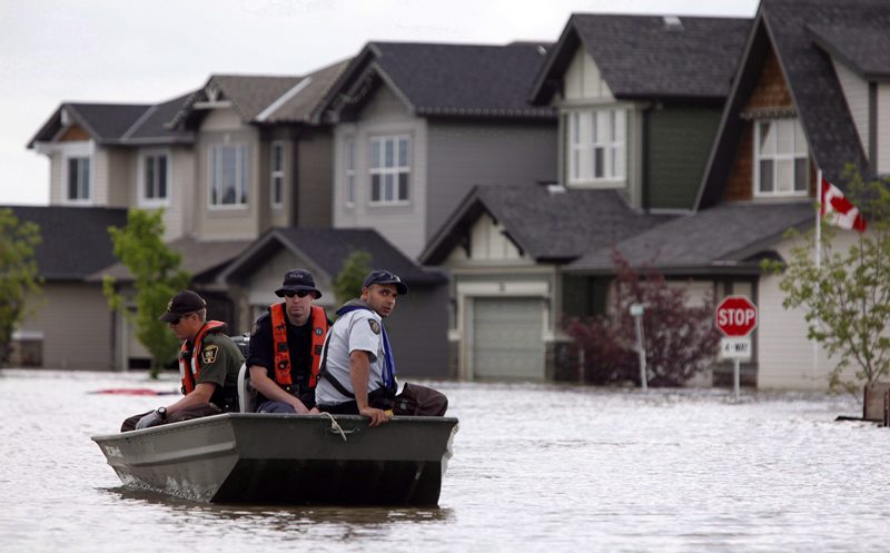 Southern Alberta town ravaged by 2013 flood sees development as promising sign Image