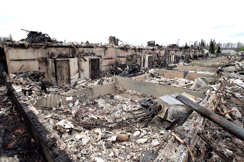 Canadians evacuated from homes after a wildfire can expect to suffer $11,300 in financial losses: Square One Insurance Image