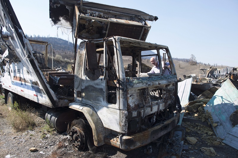 Huge wildfires in B.C. could smoulder until next spring, says official Image
