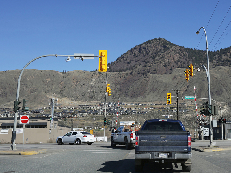 How liability is shared for this left-turn collision at a yellow stoplight Image