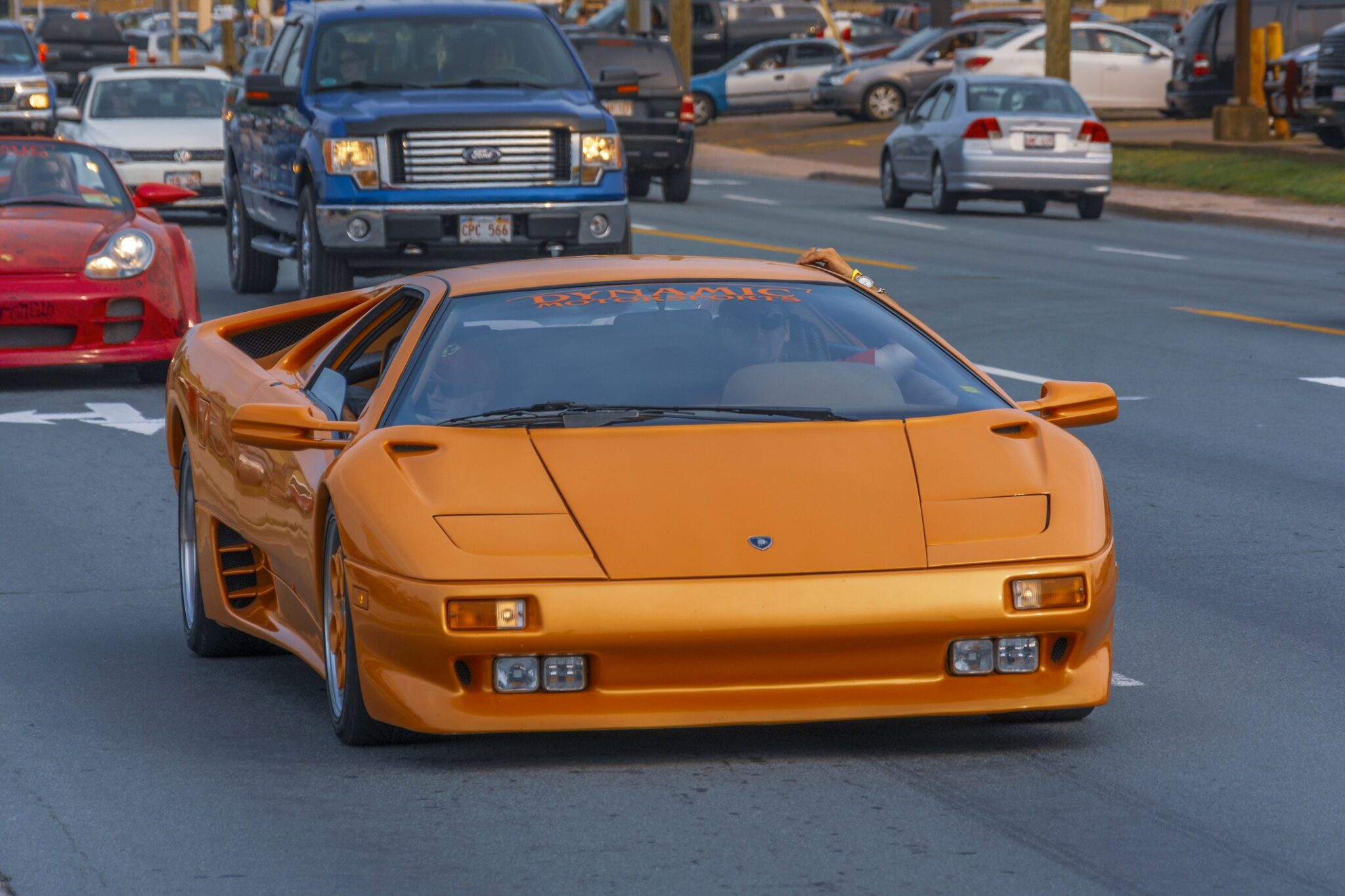 This car is orange. Do your clients know it won’t necessarily cost any extra to insure it? Image