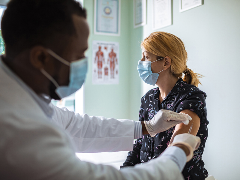 How COVID-19 vaccine side effects impact liability risk Image