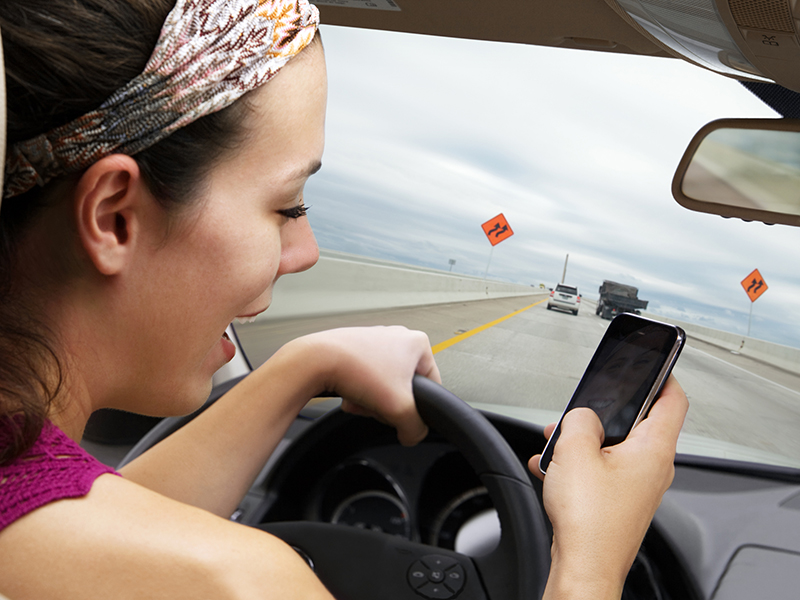 Insurer ups distracted driving from minor to major conviction Image