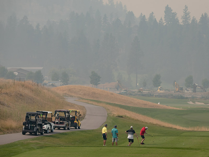 Hundreds of properties evacuated as wind prompts growth in B.C. wildfires Image
