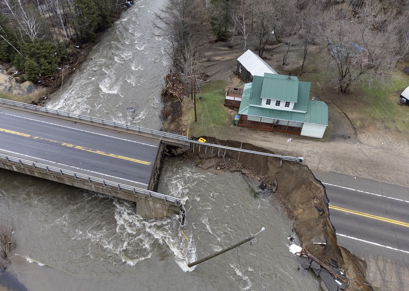Search continues for two missing firefighters swept away during spring floods Image