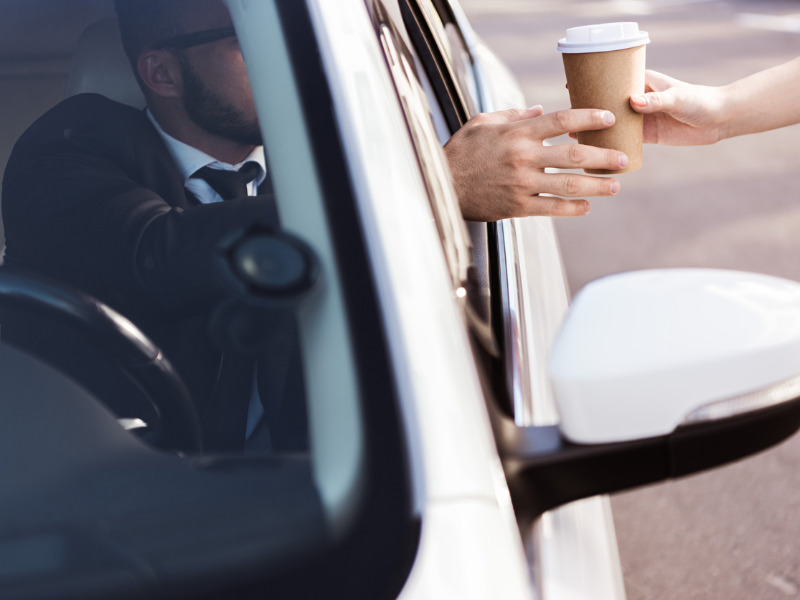 Is spilling coffee on yourself at a drive-thru an auto ‘accident’? Image