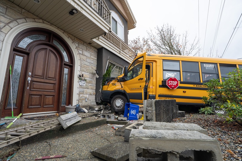 11 people sent to hospital after school bus crashes into B.C. home Image
