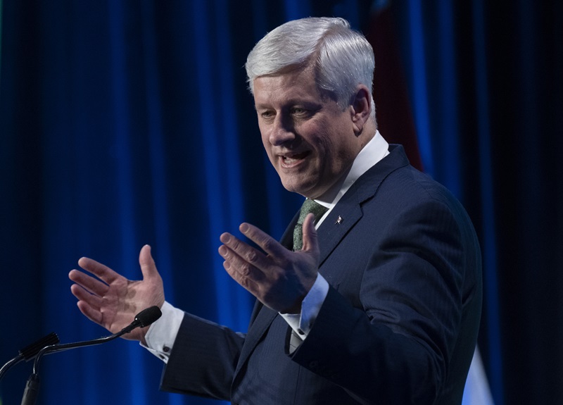Former prime minister Stephen Harper delivers the keynote address at a conference on Wednesday, March 22, 2023 in Ottawa.