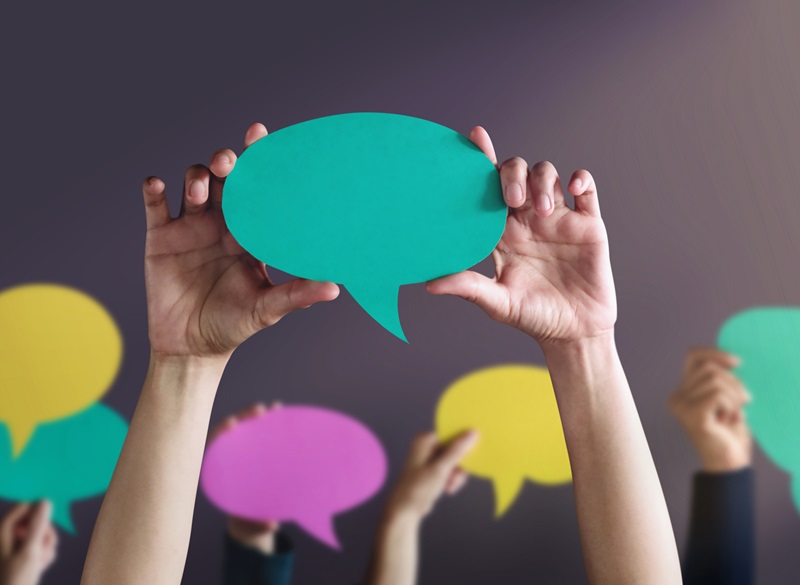 Freedom of Speech Concept. Group of People Protesting or making Campaign with a Blank Speech Bubble.