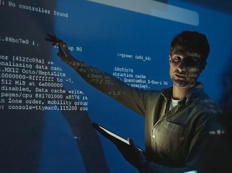 The software engineering team is meeting to review code and enhance the capabilities of the artificial intelligence