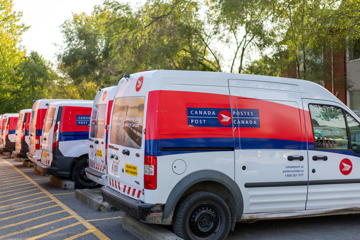 Ottawa, Canada – September 23, 2023: A Canada Post delivery trucks on parking lot. alternate text for this image