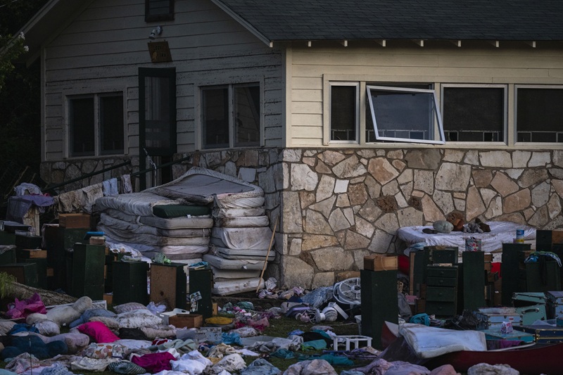 Belongings outside Camp Mystic following flooding in Texas.