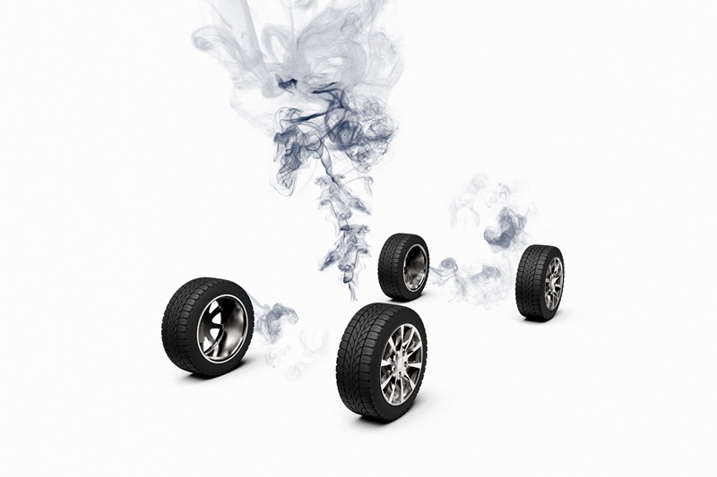 3D rendering of a conceptual image of a car disappearing leaving just the wheels