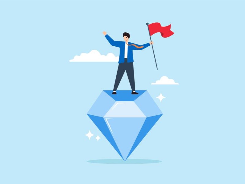 Insurance broker standing atop a diamond to represent value