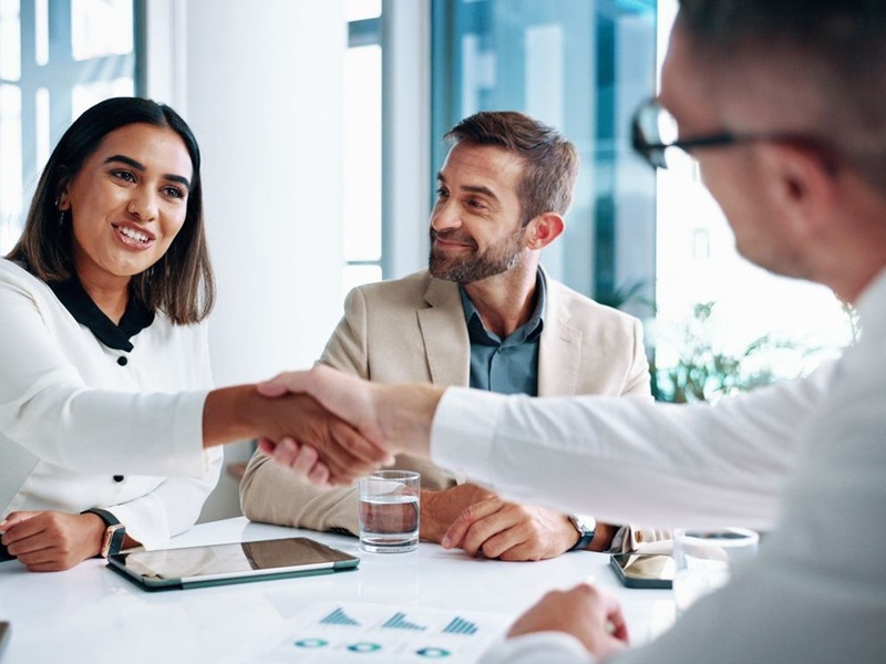 Business people meeting and shaking hands