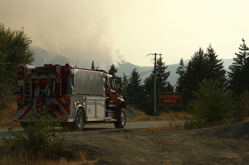 A fire truck near the Wesley Ridge wildfire by Coombs, B.C.