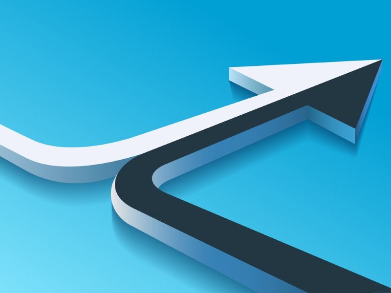 Arrows merging together to illustrate a business merger