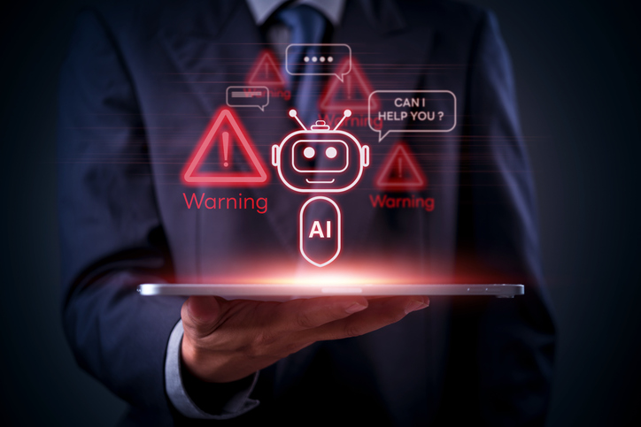 AI, technology, and cybersecurity warnings displayed as red holograms above a tablet in businessman hand, future chatbot. Robot assistant, danger alert, privacy breach, and hacker risk alternate text for this image