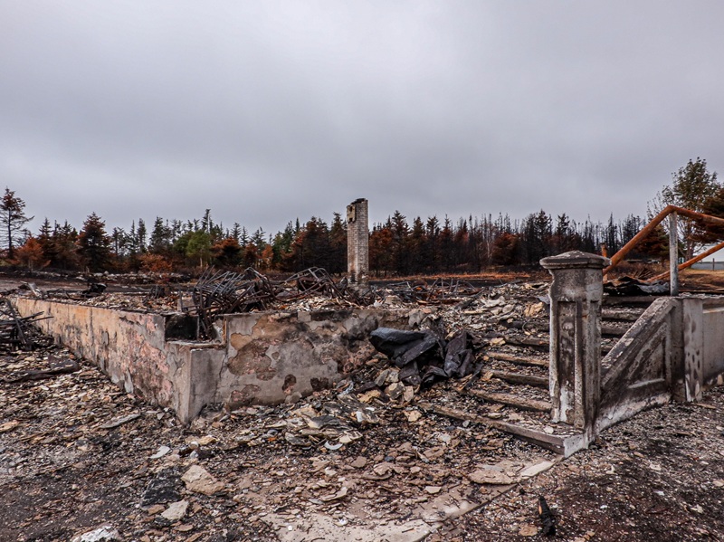 The ruins of a former school following a wildfire in Newfoundland.