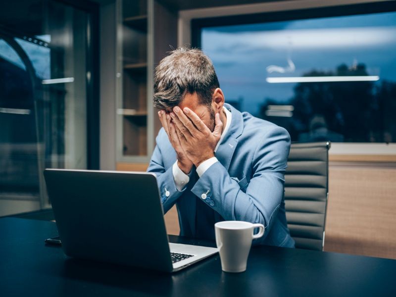 Overwhelmed insurance industry worker