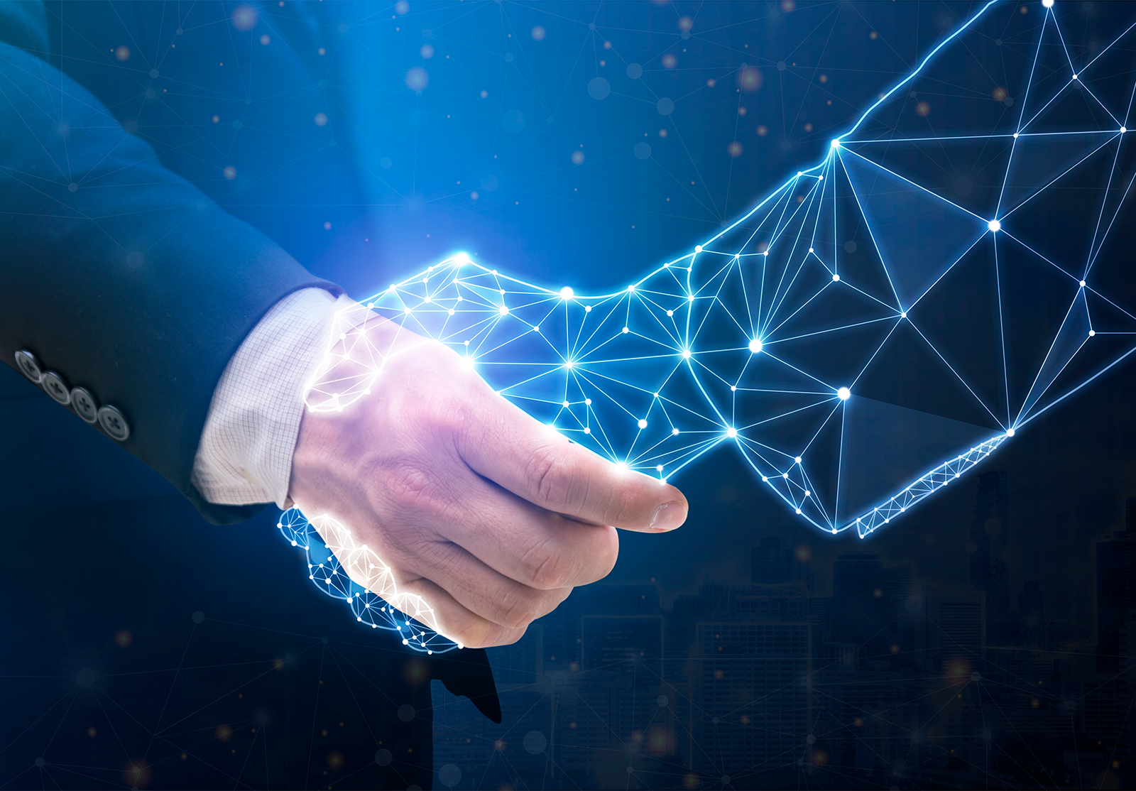 A human hand in a business suit shakes hands with a glowing, polygonal digital hand, symbolizing partnership between people and technology against a futuristic cityscape backdrop.