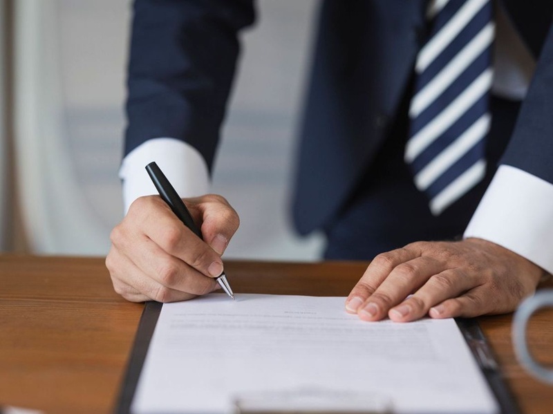 Signing an important document