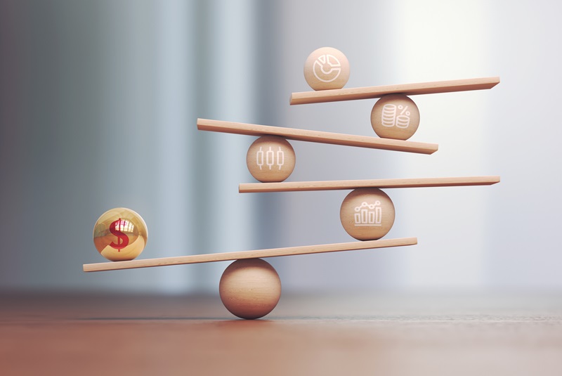 3d Render Yellow Red Metal Ball Dollar Symbol on Wooden Libra Scale and Wooden Financial Charts, Economy and finance concept, Depth Of Field