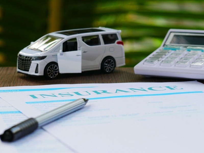 Car with insurance documents