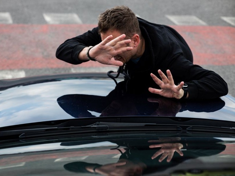 Man being struck by car