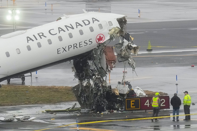 An Air Canada jet collides with a fire truck at LaGuardia airport.