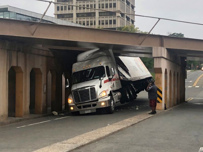 Truck crashed into a low overpass