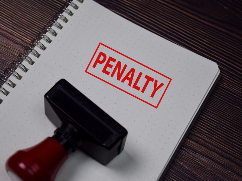 Rubber stamper with 'penalty' text on white background